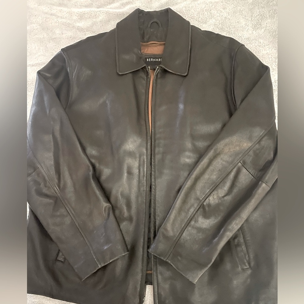 Men’s black leather zip jacket. Removable quilted zip-in lining.